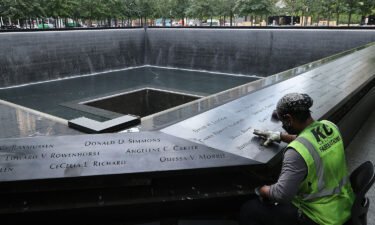 Polishing work is done on the bronze parapets surrounding the twin Memorial pools. A new CNN Poll finds that 57% of Americans say the attacks impacted the way they live their life today.