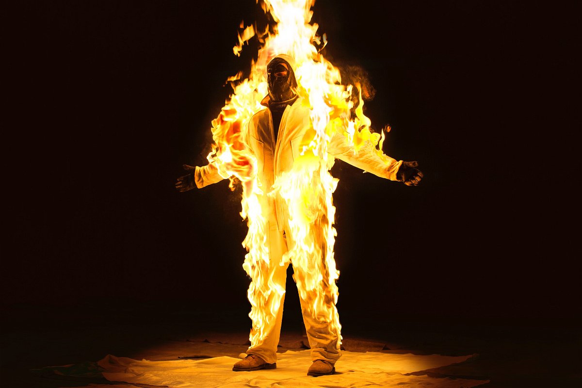 <i>Cassils with Manuel Vason</i><br/>Cassils engulfed in flames as part of the performance work 