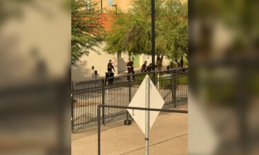 Evan Courtney shot this image of police responding to scene in Tucson