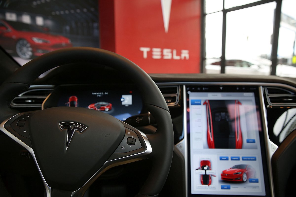 <i>Spencer Platt/Getty Images</i><br/>The inside of a Tesla vehicle is viewed as it sits parked in a new Tesla showroom and service center.