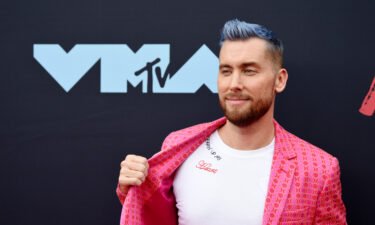 *NSYNC alum Lance Bass and husband Michael Turchin welcomed home twins Violet Betty and Alexander James. Bass is shown here ate the MTV Video Music Awards.