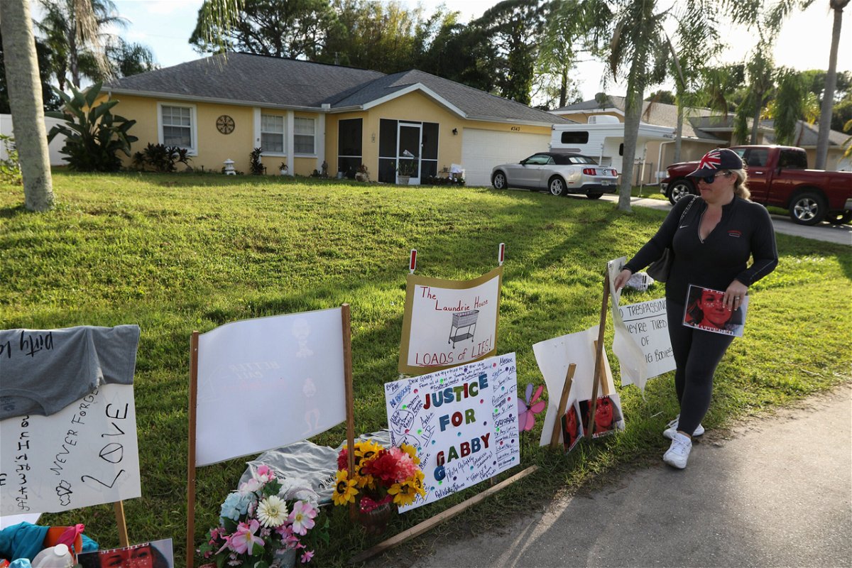 <i>Thomas O'Neill/NurPhoto via Getty Images</i><br/>The North Port Police Department confirmed on October 28 that the Gabby Petito memorial set up in front of the Laundrie family property has been taken down by city officials.