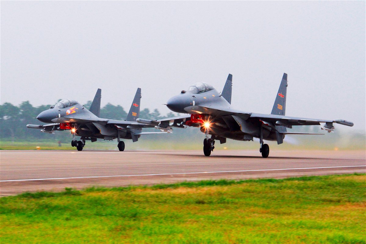 <i>Jin Danhua/Xinhua/AP/File</i><br/>In this undated file photo two Chinese SU-30 fighter jets take off from an unspecified location to fly a patrol over the South China Sea. China flew more than 30 military planes