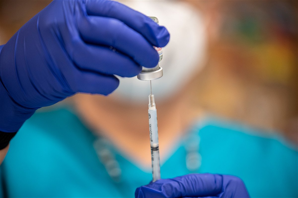<i>Sergio Flores/Getty Images</i><br/>The Pentagon has laid out its enforcement and punishment procedures for its civilian Covid-19 vaccine mandate with just over a month to go until the deadline for civilian employees to be fully vaccinated.