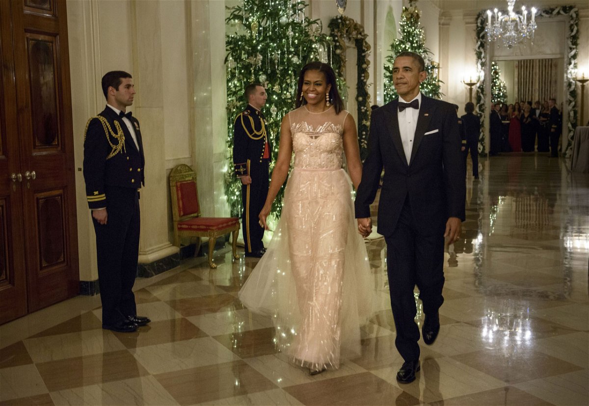 <i>Brendan Smialowski/AFP/Getty Images</i><br/>First Lady Michelle Obama wearing Monique Lhuillier in 2014