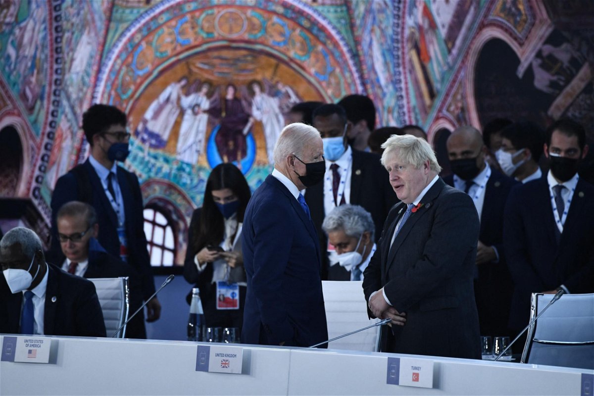 <i>Brendan Smialowski/Pool/AFP/Getty Images</i><br/>US President Joe Biden (C) and British Prime Minister Boris Johnson talk prior to the opening session of the G20 of World Leaders Summit on October 30