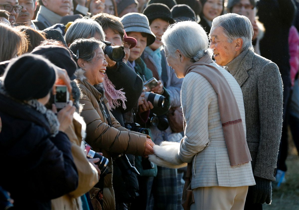 <i>Issei Kato/Reuters</i><br/>Fumiko Shirataki shakes hands with Japan's then-Empress Michiko in January 2019.