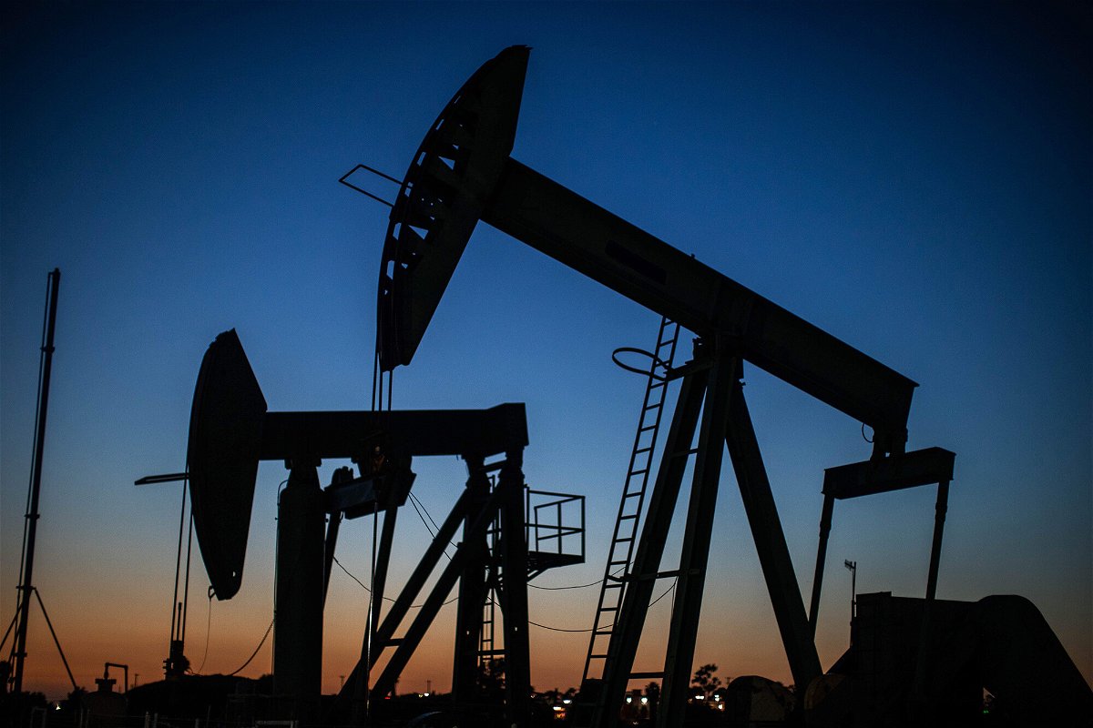 <i>Apu Gomes/AFP/Getty Images</i><br/>US oil jumped another 1.2% to trade as high as $85.07 a barrel. Oil pumpjacks are shown here operating at dusk Willow Springs Park in Long Beach