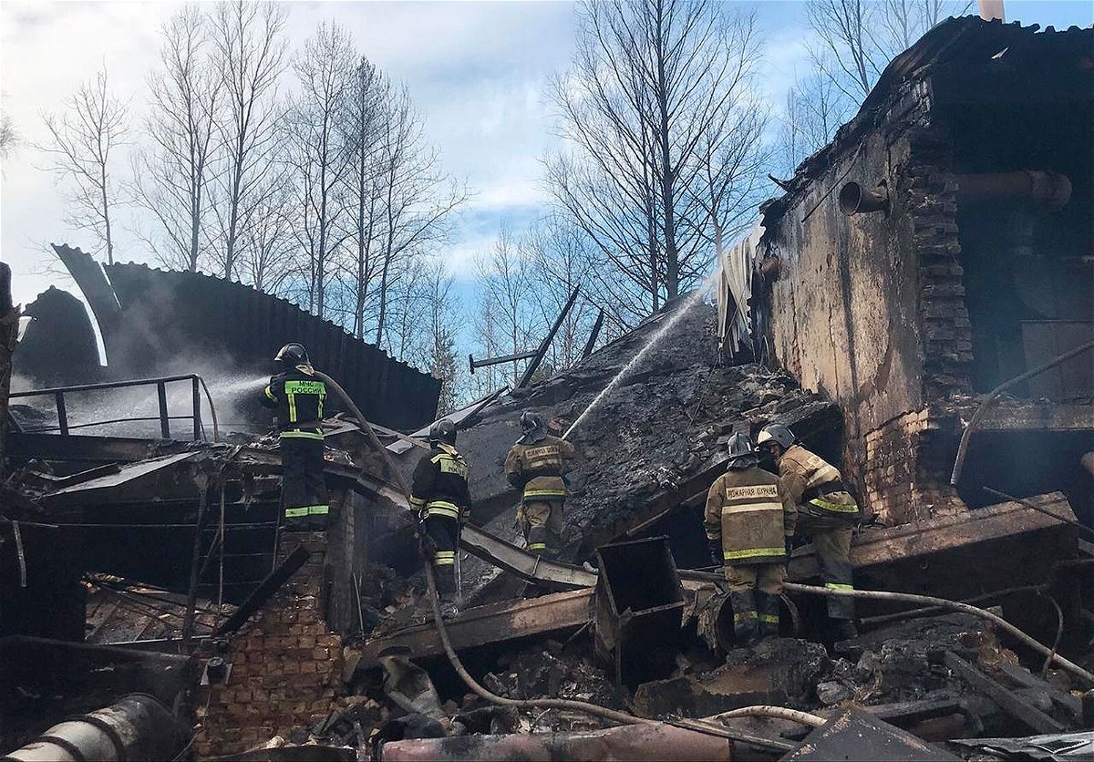<i>Russian Ministry of Emergency Situations/AP</i><br/>Russian officials released this photo of emergency personnel working at the site of an explosion and fire at a gunpowder factory in the Ryazan region