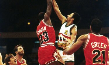 Michael Jordan playing for the Chicago Bulls during the 1984 NBA game in Denver