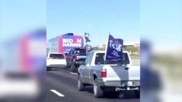Joe Biden's campaign bus surrounded by a Trump caravan in Texas.