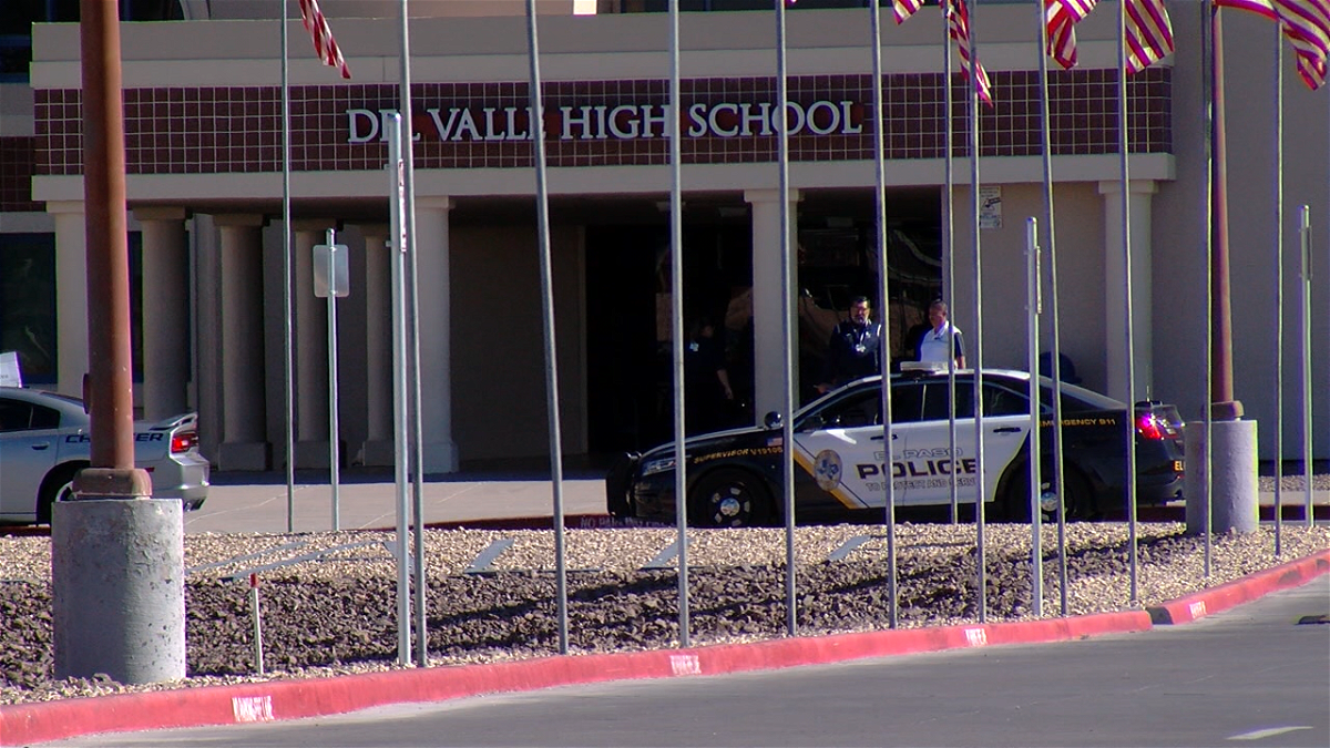 El Paso police at Del Valle High School after a threatening message was discovered.