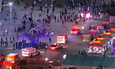Ambulances arrive on the scene after a crowd surge at Astroworld Festival.