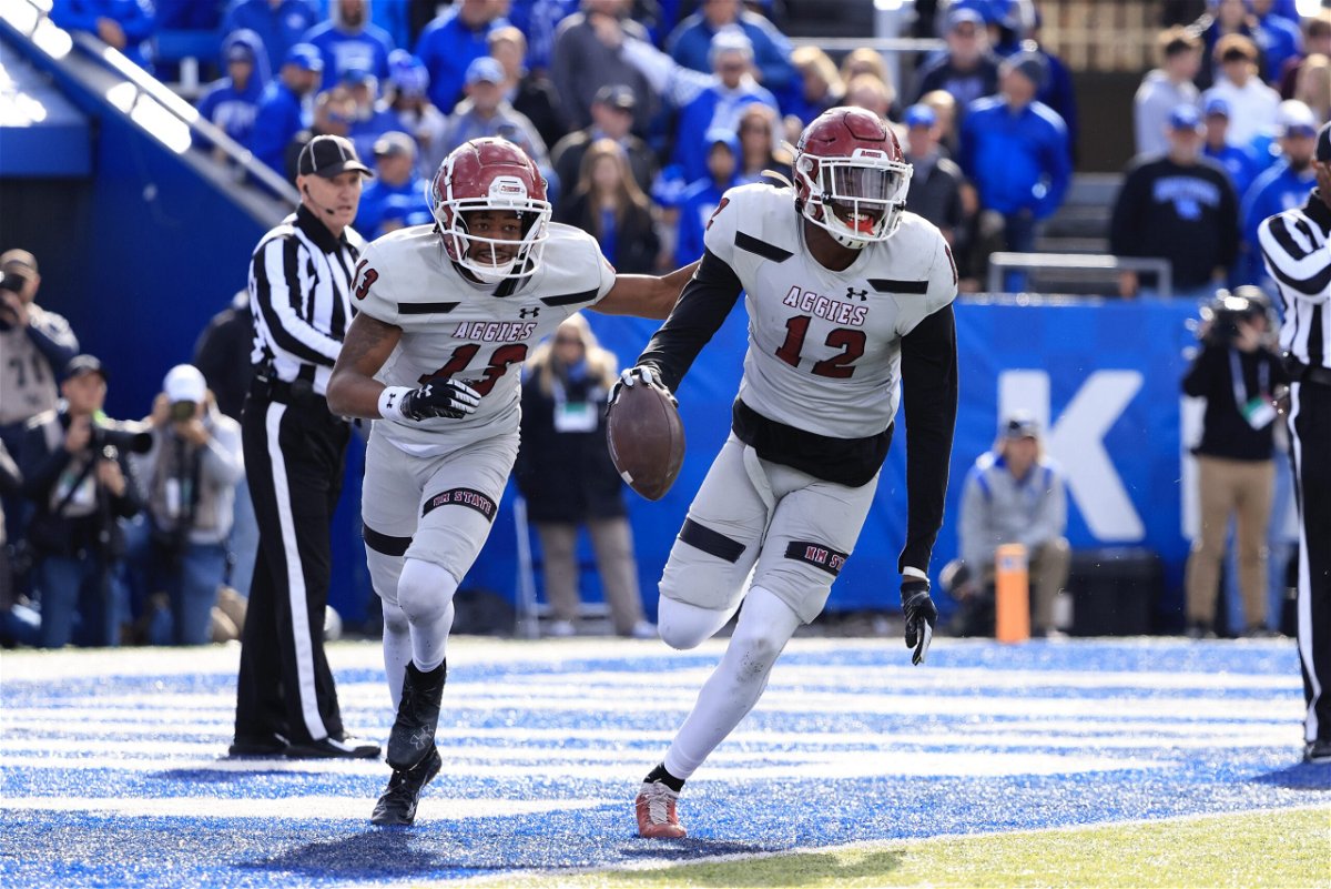 The NMSU Aggies in action against the Kentucky Wildcats.