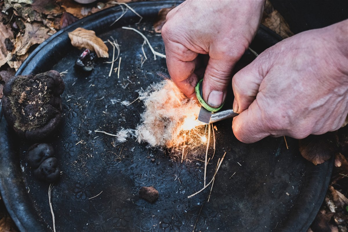 <i>Mint Images/Getty Images</i><br/>Materials for starting a fire are among the list of wildnerness essentials.