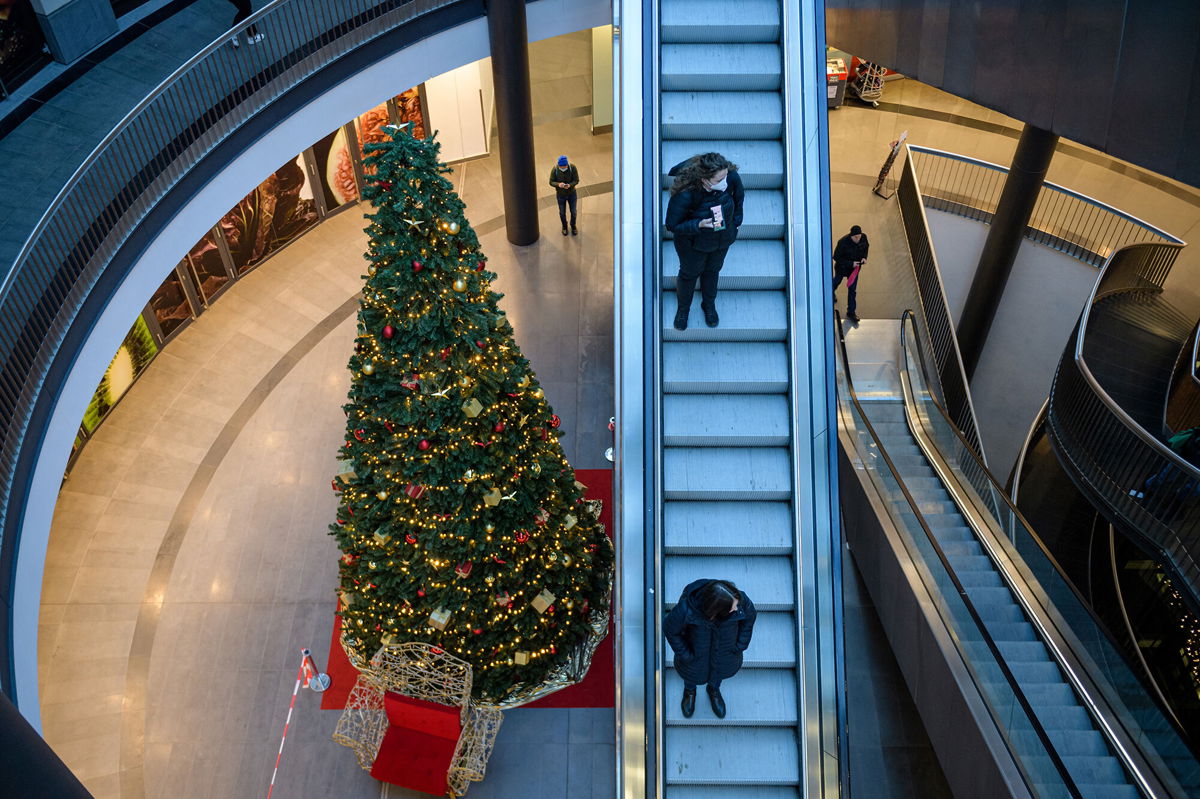 <i>Stinger/AFP/Getty Images</i><br/>Customers visit a Christmas-decorated shopping center in Leipzig