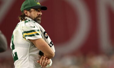 Aaron Rodgers #12 of the Green Bay Packers watches action from the sideline during the second half of a game against the Arizona Cardinals at State Farm Stadium on October 28 in Glendale