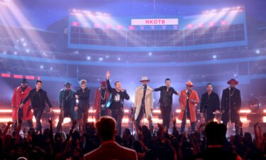 Members of New Edition and New Kids On The Block perform onstage during the 2021 American Music Awards at Microsoft Theater on November 21