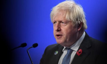 UK Prime Minister Boris Johnson speaks during a press conference at the COP26 UN Climate Change Conference in Glasgow on November 10.