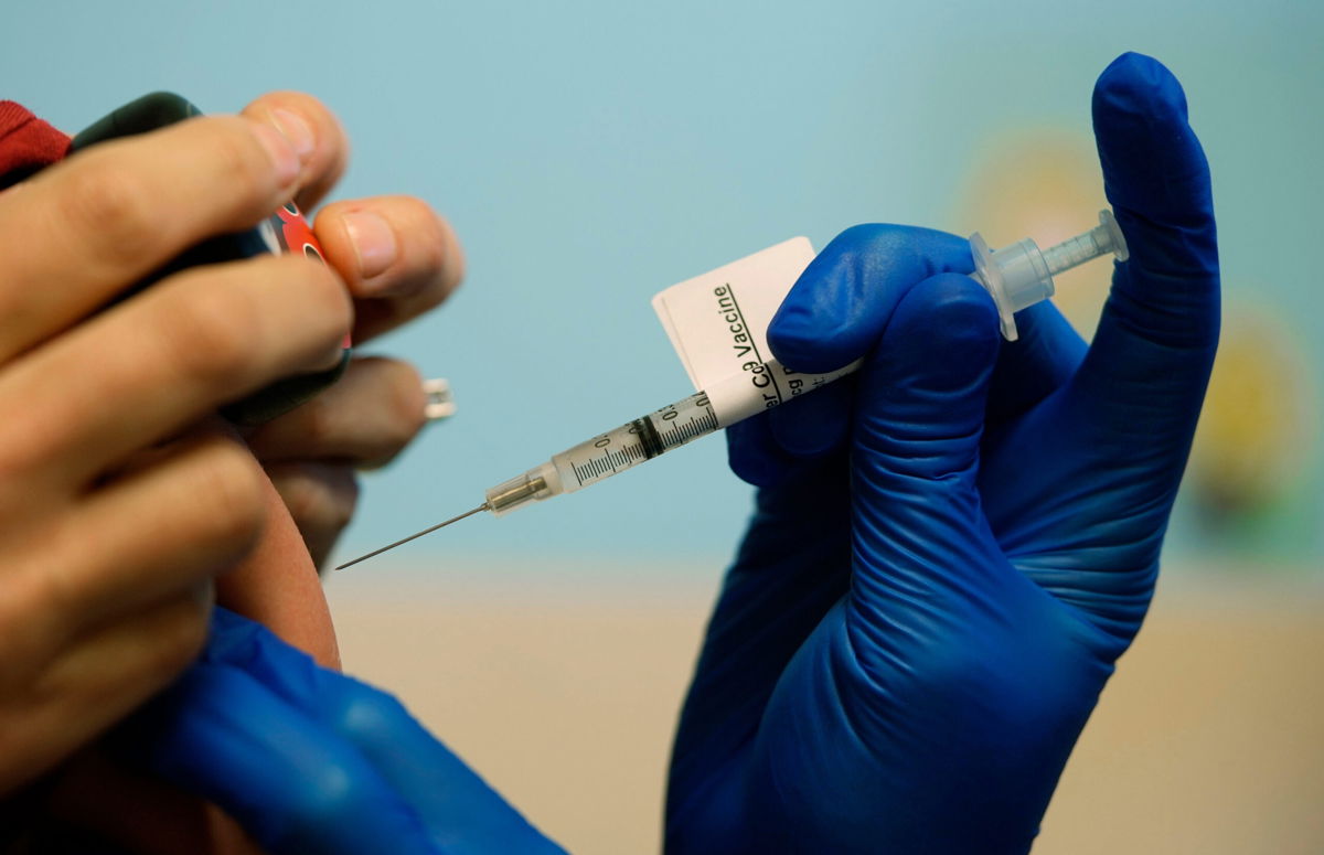 <i>David Zalubowski/AP</i><br/>Gatherings of more than 500 people in parts of metro Denver will require attendees to provide proof of vaccination. A dose of Pfizer pediatric Covid-19 vaccine is administered to a young patient in east Denver.