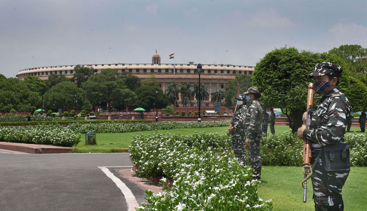 <i>Arvind Yadav/Hindustan Times/Getty Images</i><br/>India Prime Minister Narendra Modi's government on Tuesday said that it is preparing to introduce a bill that would regulate digital currencies. Security personnel are shown here outside the Parliament House during the ongoing monsoon session on August 4