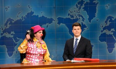 Cecily Strong (L) as Goober The Clown and anchor Colin Jost during Weekend Update on Saturday