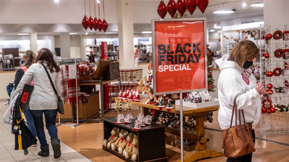 Shoppers take advantage of Macy's Black Friday specials.