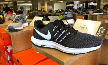 Nike running shoes are displayed at a DSW store on September 14