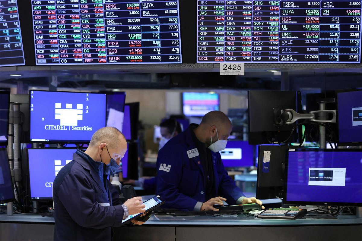 <i>ANDREW KELLY/REUTERS</i><br/>Traders work on the trading floor at the New York Stock Exchange (NYSE) in Manhattan
