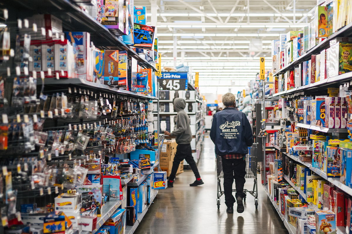 Shoppers look for deals at a Walmart store in Houston, Texas.