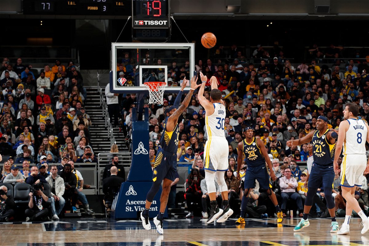 Stephen Curry #30 of the Golden State Warriors shoots a three point basket against the Indiana Pacers on December 13, 2021.