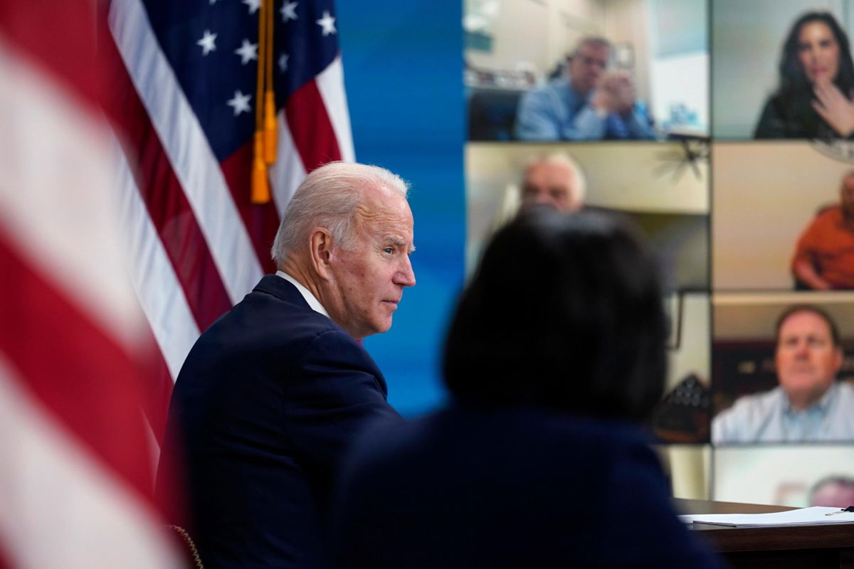 <i>Carolyn Kaster/AP</i><br/>President Joe Biden participates in the White House COVID-19 Response Team's regular call with the National Governors Association in the South Court Auditorium in the Eisenhower Executive Office Building on the White House Campus on December 27.