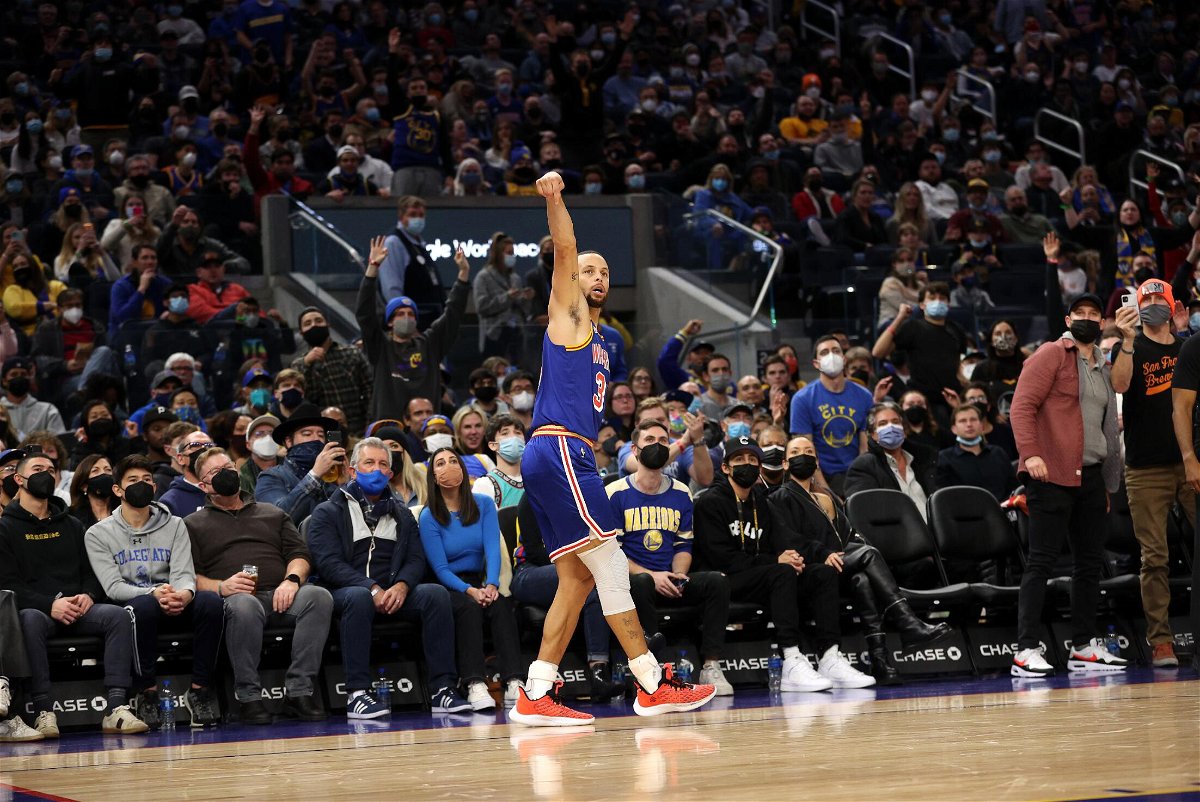 <i>Ezra Shaw/Getty Images North America/Getty Images</i><br/>Stephen Curry watches his 3000th made career three-pointer.