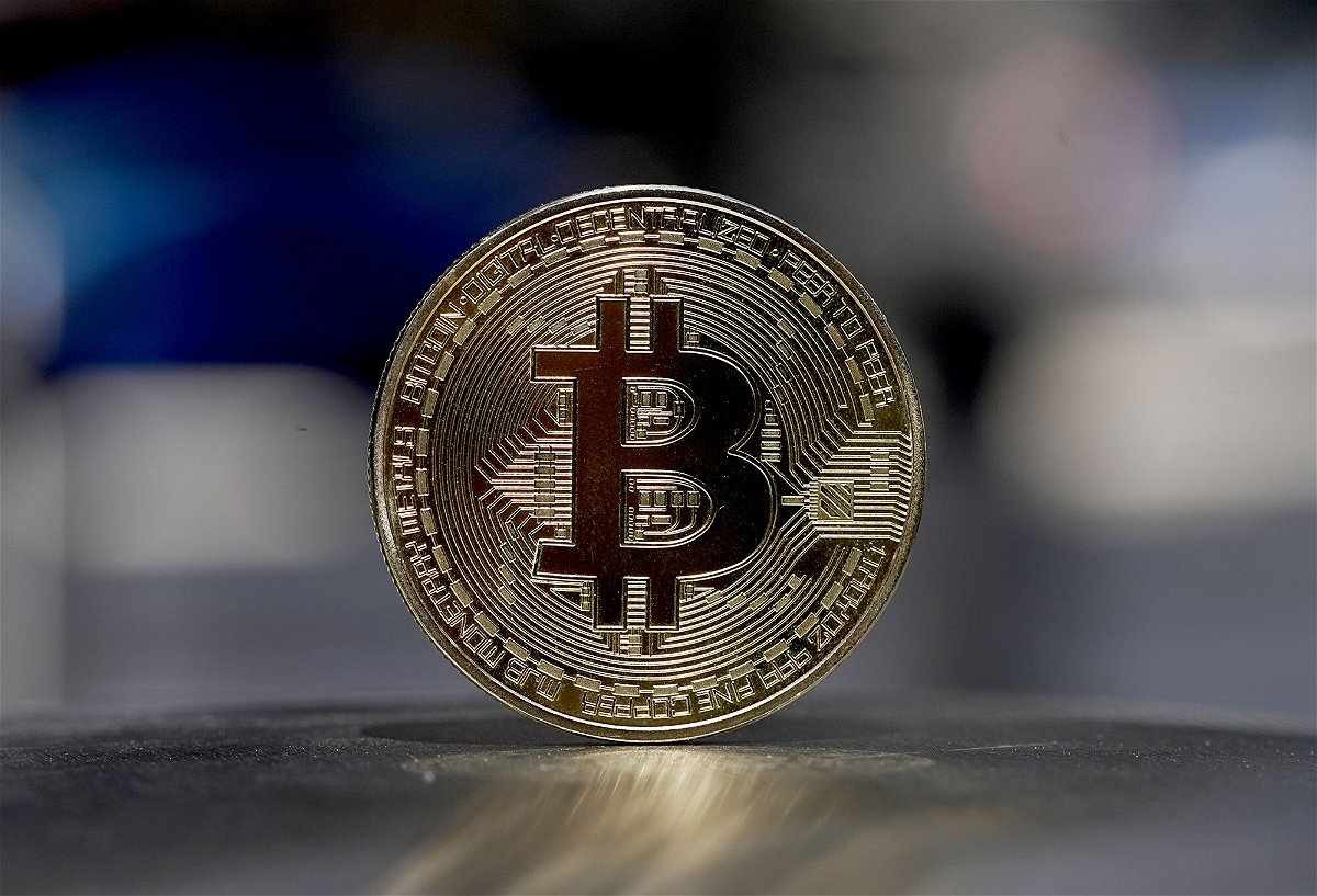 <i>Edward Smith/Getty Images</i><br/>Get ready for even more bitcoin and other exotic ETFs in 2022. A visual representation of Bitcoin cryptocurrency is pictured on May 30 in London
