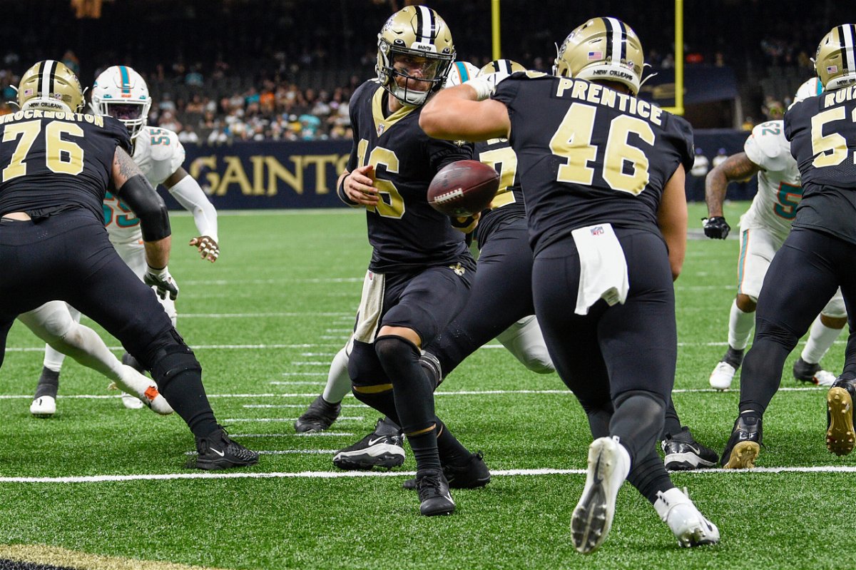 <i>Ken Murray/Icon Sportswire/Getty Images</i><br/>The Miami Dolphins' hot streak continued with a 20-3 win against the New Orleans Saints at the Caesars Superdome on Monday Night Football. Ian Book (16) hands off to New Orleans Saints fullback Adam Prentice (46) during second half action.
