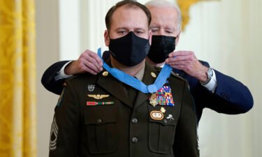 President Joe Biden presents the Medal of Honor to Army Master Sgt. Earl Plumlee for his actions in Afghanistan on Aug. 28
