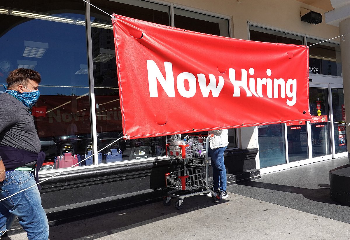 <i>Joe Raedle/Getty Images</i><br/>A key unemployment measure hasn't been this low in 52 years. A Now Hiring sign hangs in front of a Winn-Dixie grocery store on December 03 in Miami