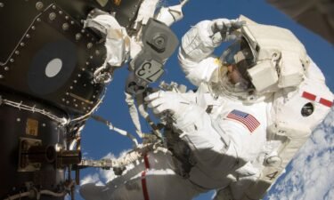 NASA astronaut Dr. Thomas Marshburn is seen during his first spacewalk on July 20