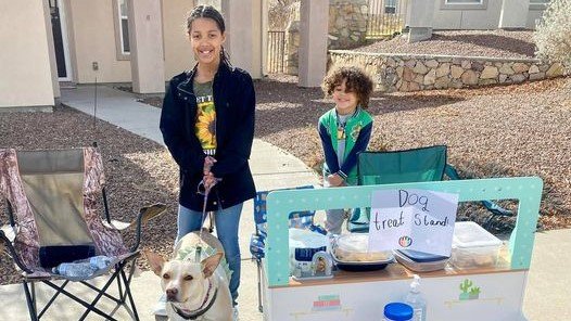 Fort Bliss family holds dog treat fundraiser to honor Betty White's love for animals.