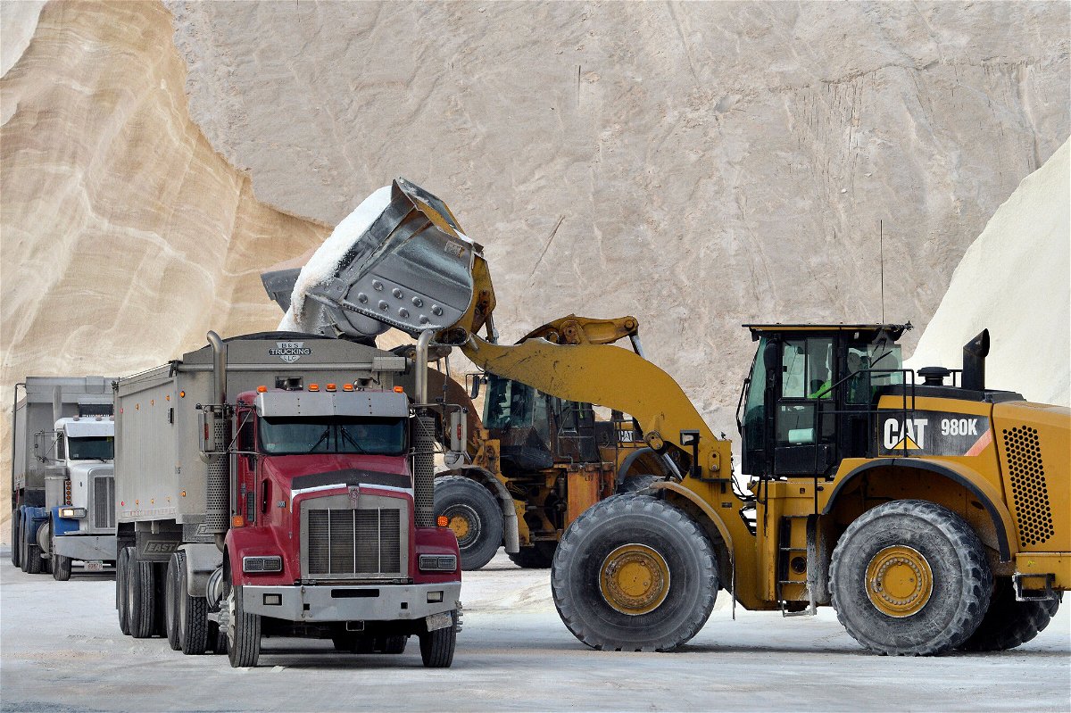 <i>Joseph Prezioso/AFP/Getty Images</i><br/>A bulldozer loads trucks with salt at Eastern Salt in Chelsea