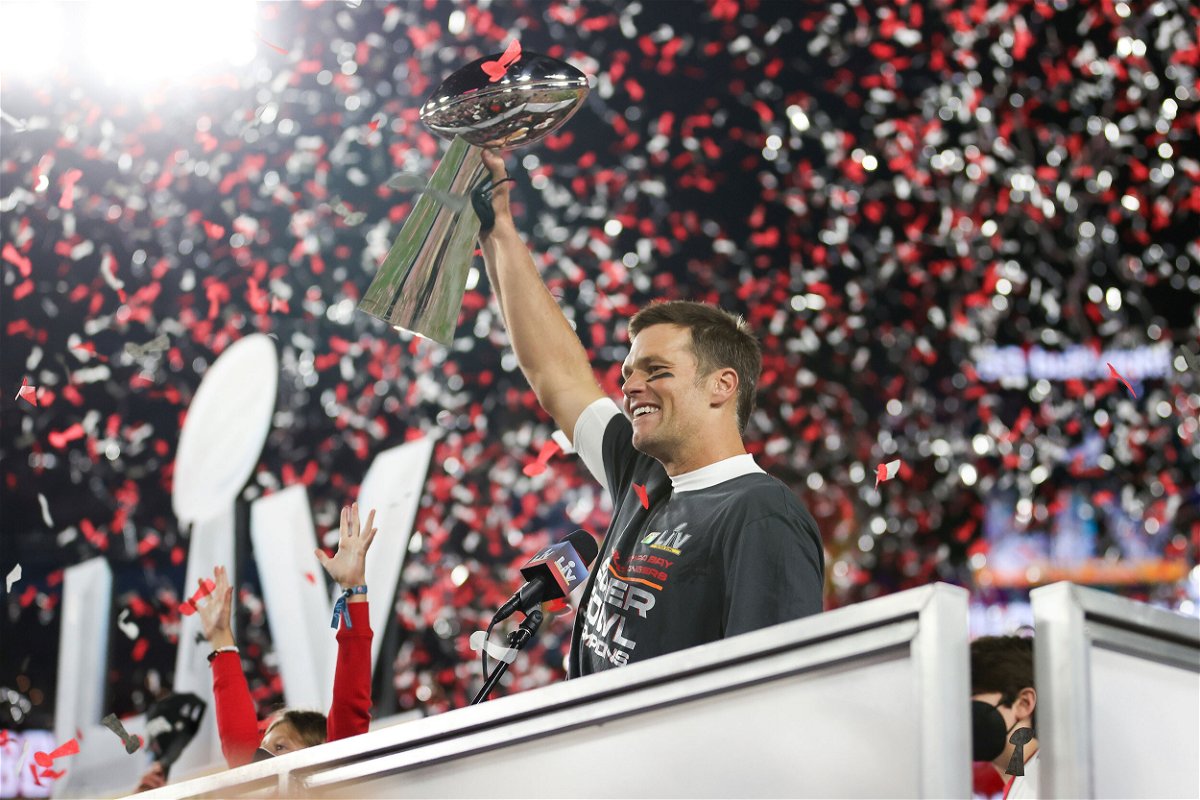Tampa Bay Buccaneers quarterback Tom Brady (12) holds the Vince Lombardi trophy following the NFL Super Bowl 55 football game against the Kansas City Chiefs