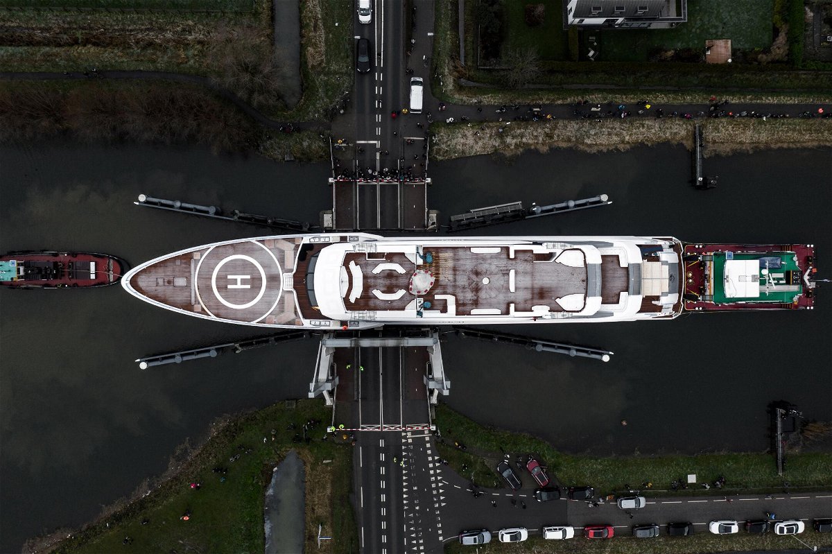 <i>Heesen/SWNS</i><br/>Incredible pictures show a superyacht seemingly scraping under low bridges - with 12 cm clearance. Dutch shipbuilders Heesen were tasked with transporting the 80m boat MY Galactica from its shed in Oss to the North Sea.