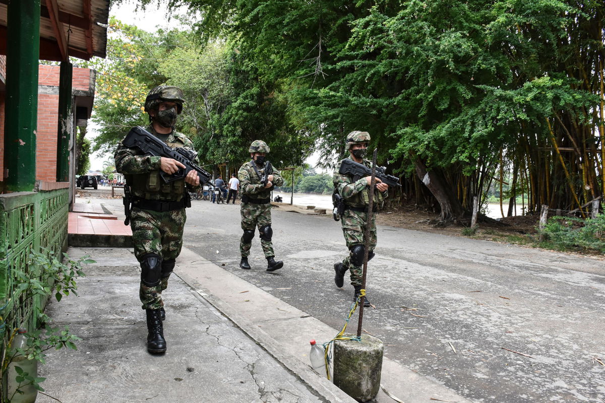 <i>Daniel Martinez/AFP/Getty Images</i><br/>Colombian soldiers on patrol in Aracua