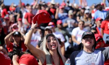 Supporters of President Donald Trump chant "Latinos for Trump!" during a campaign rally in October 2020