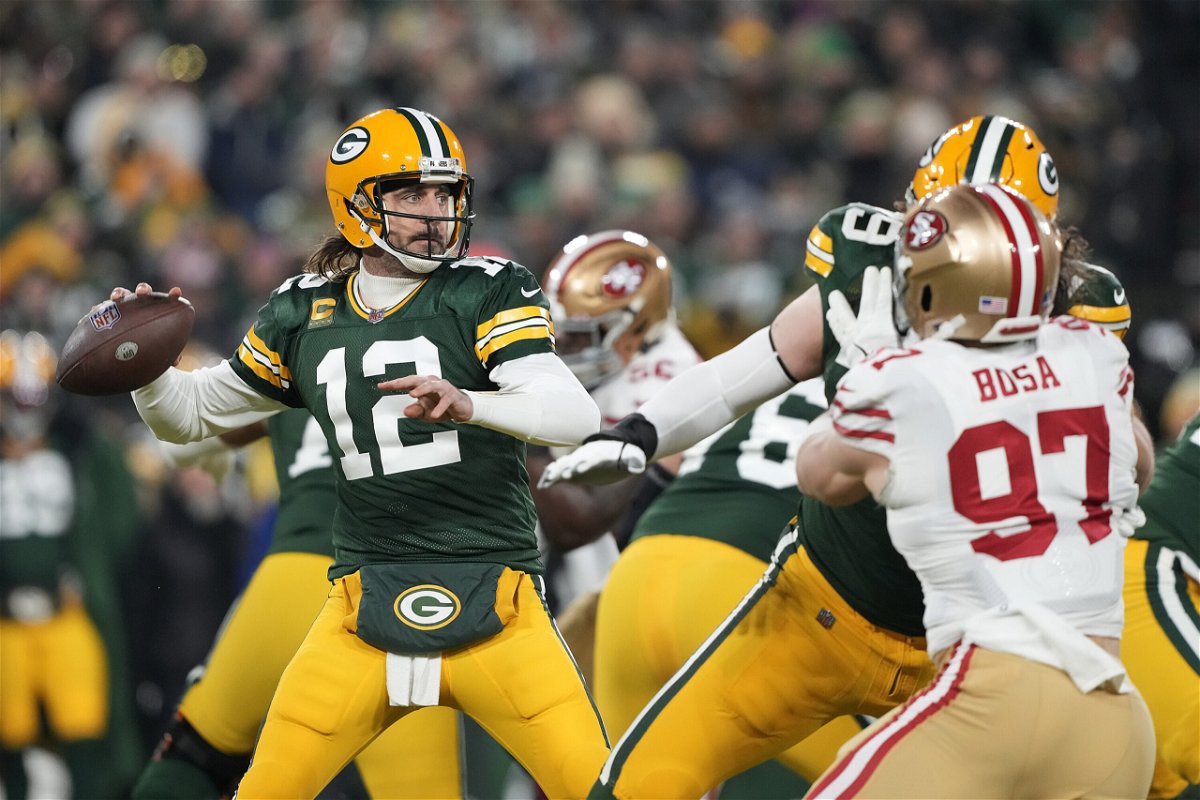<i>Patrick McDermott/Getty Images</i><br/>Rodgers passes during the 1st quarter of the NFC Divisional Playoff game against the San Francisco 49ers.