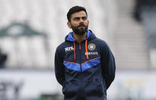 Virat Kohli looks on as the India team warms up ahead of the fourth day of the second Test cricket match between South Africa and India in Johannesburg on January 6