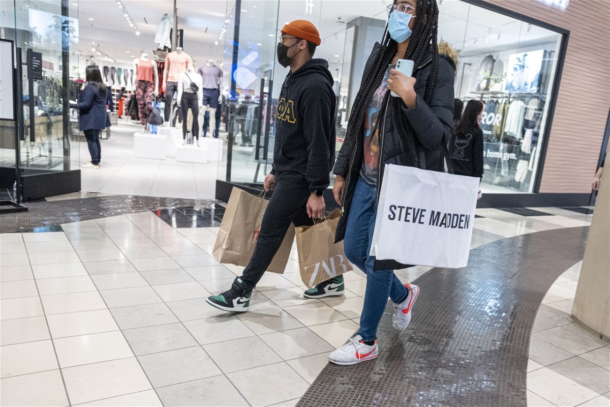 <i>David Paul Morris/Bloomberg/Getty Images</i><br/>Shoppers carry bags inside the Westfield San Francisco Centre shopping mall in San Francisco