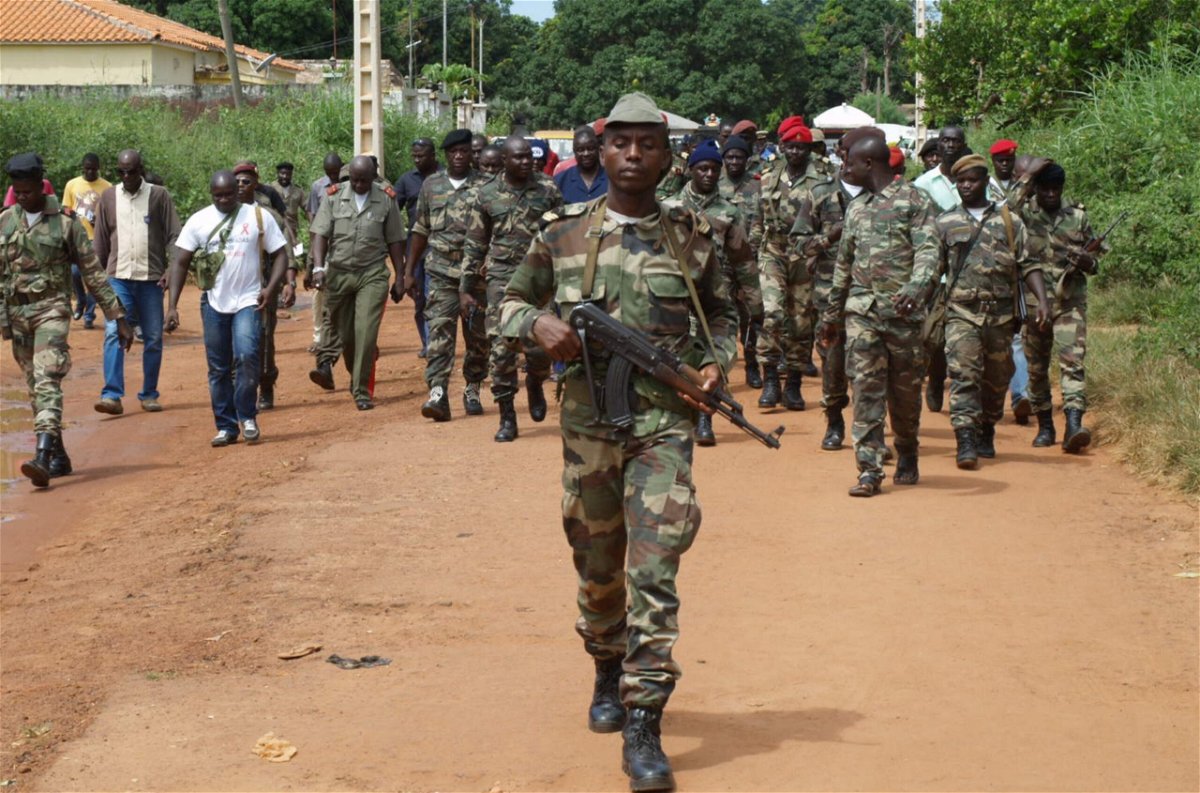 <i>AFP/Getty Images</i><br/>Soldiers walk in Guinea-Bissau's capital in 2012.