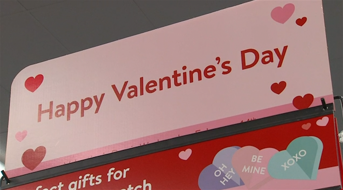 A Valentine's Day sign inside a store. 