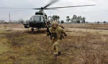 Service members of the Ukrainian Air Assault Forces partake in tactical drills at a training ground in an unknown location in Ukraine